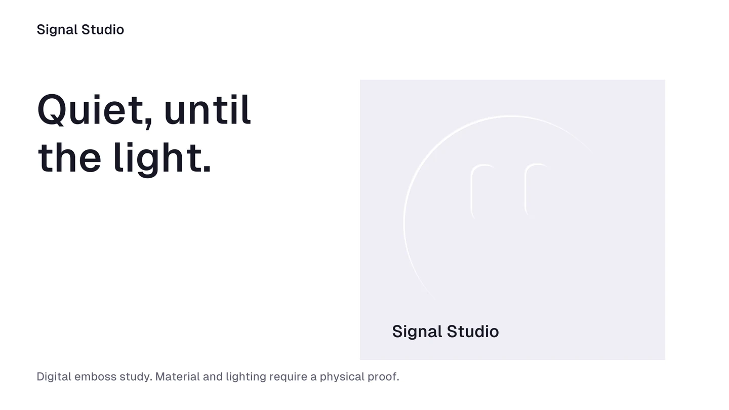 A pale embossed Dot catches simulated raking light on a pale card.